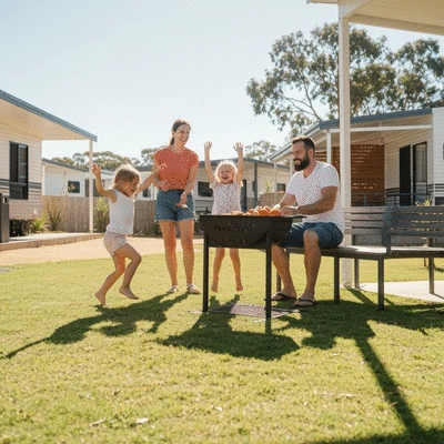Family enjoying a BBQ at a modern caravan park in Australia, kids playing in background, sunny day, no text, no words, no typography, clean image
